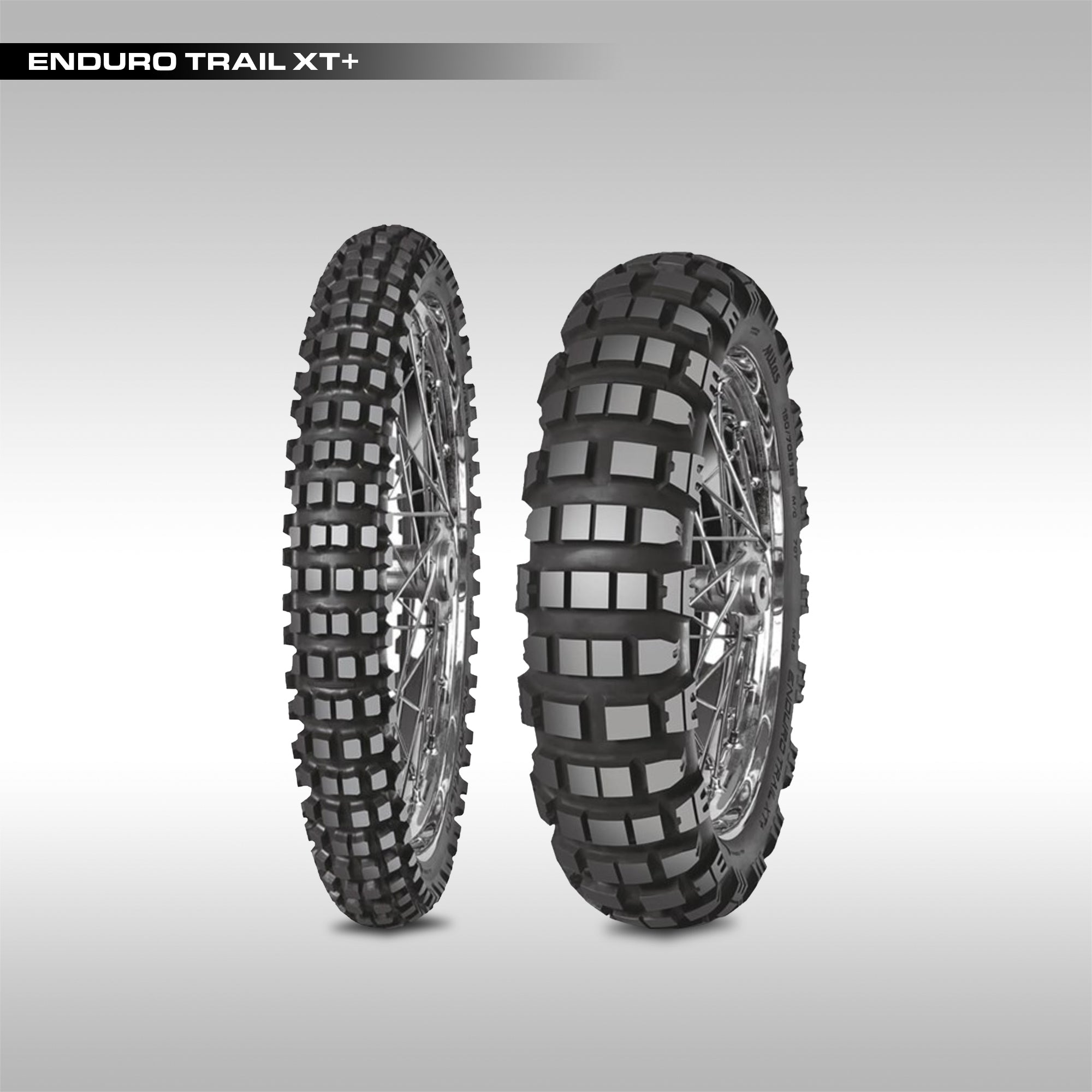 Front and rear Mitas Tyres Enduro Trail XT Plus tires,  displayed vertically with their tread patterns visible on a gray background