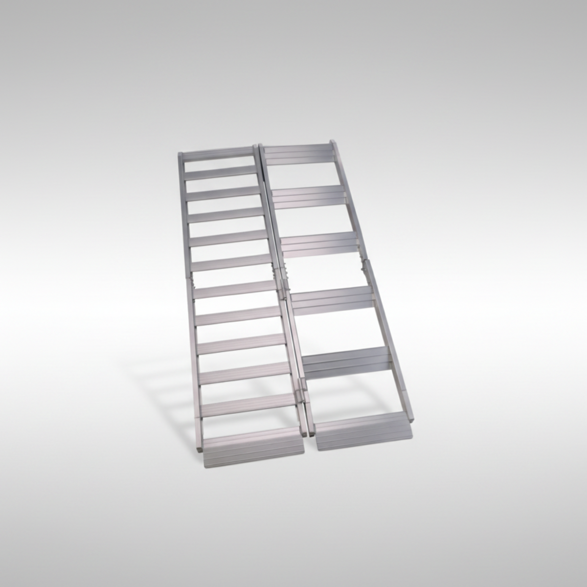 Moose Racing 3910-0116 folding aluminum step ramp showing the integrated walking stairs for loading dirt bikes.