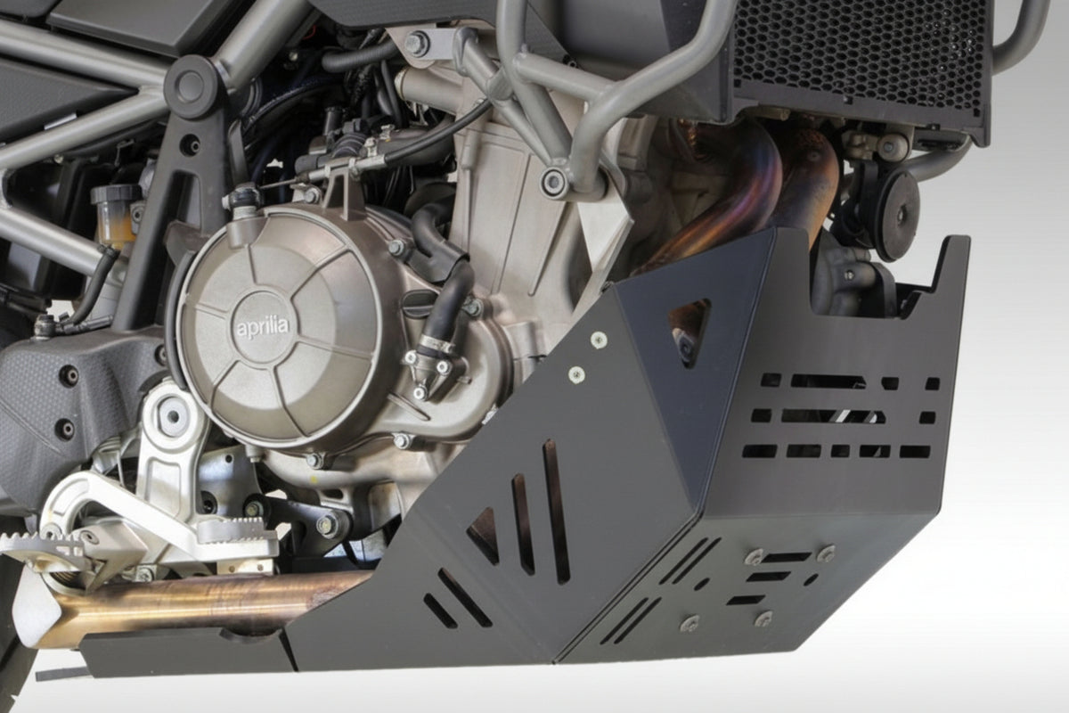 Black AXP Racing 8mm HDPE skid plate installed on an Aprilia Tuareg 660 adventure motorcycle.