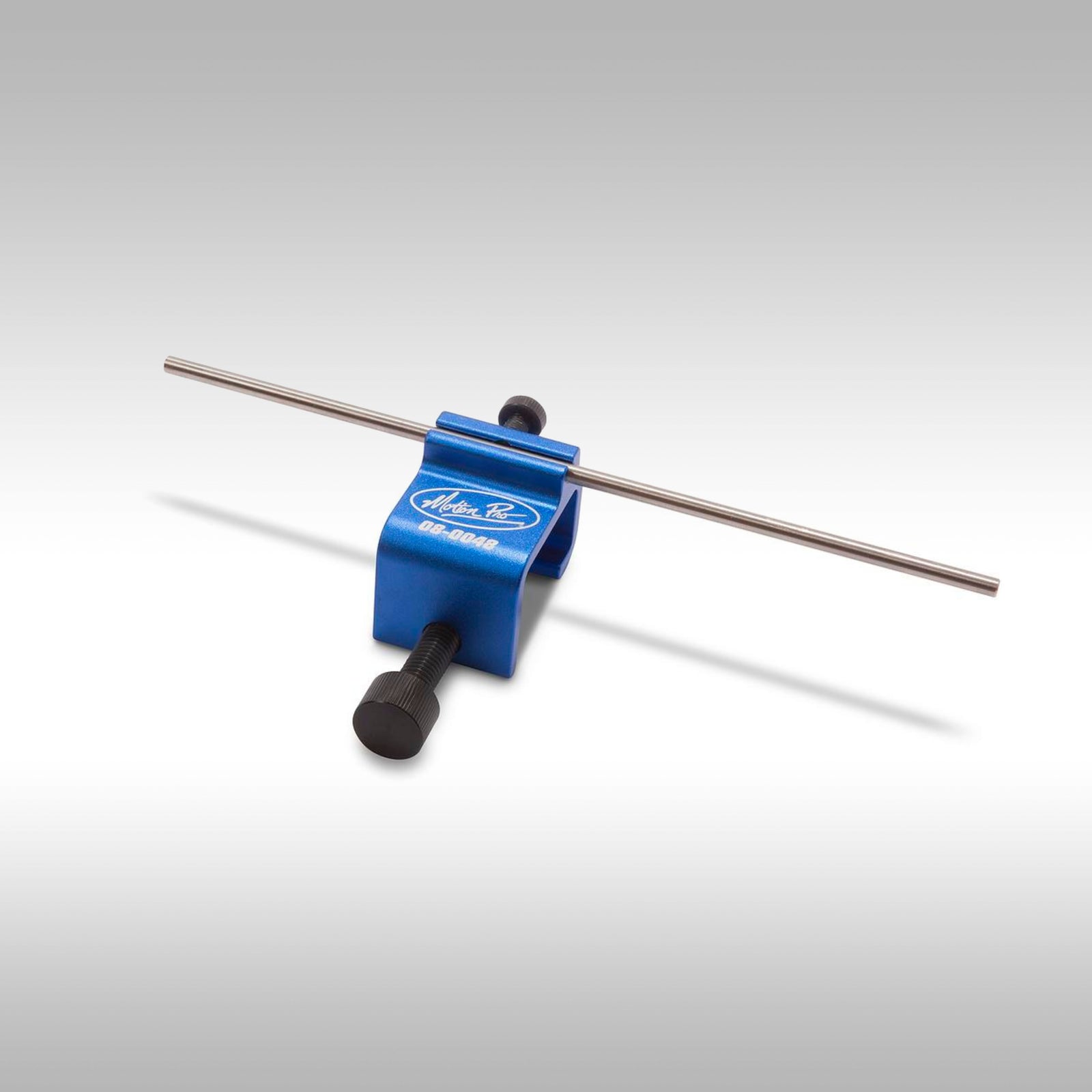 Blue chain alignment tool with a metallic rod on a gray background