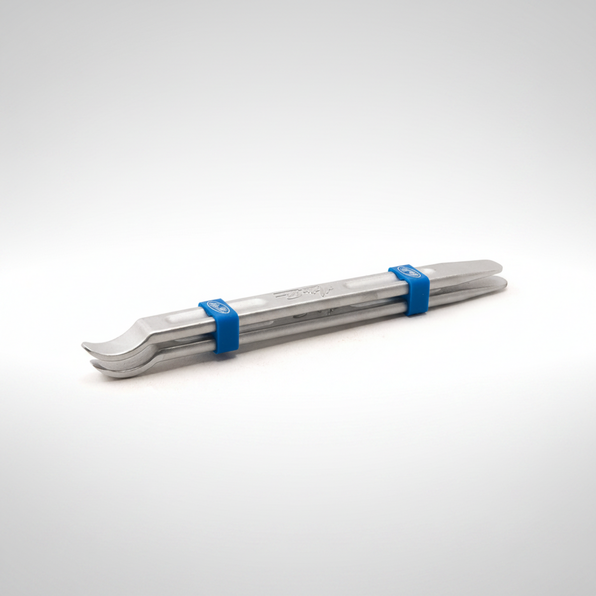 Pair of Motion Pro tire irons with blue keepers on a light gray background.