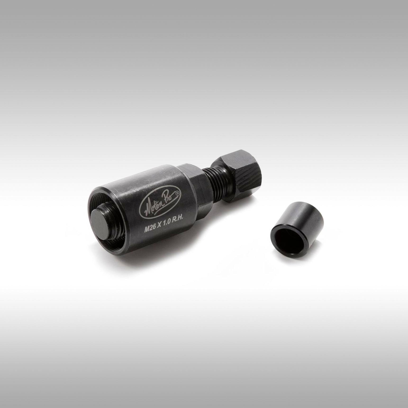 Black steel Motion Pro flywheel puller 08-0293 on a gray background