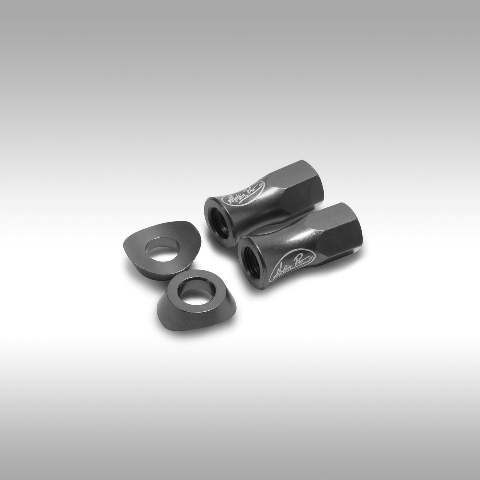 Motion Pro rim lock nut and collar on a gray background