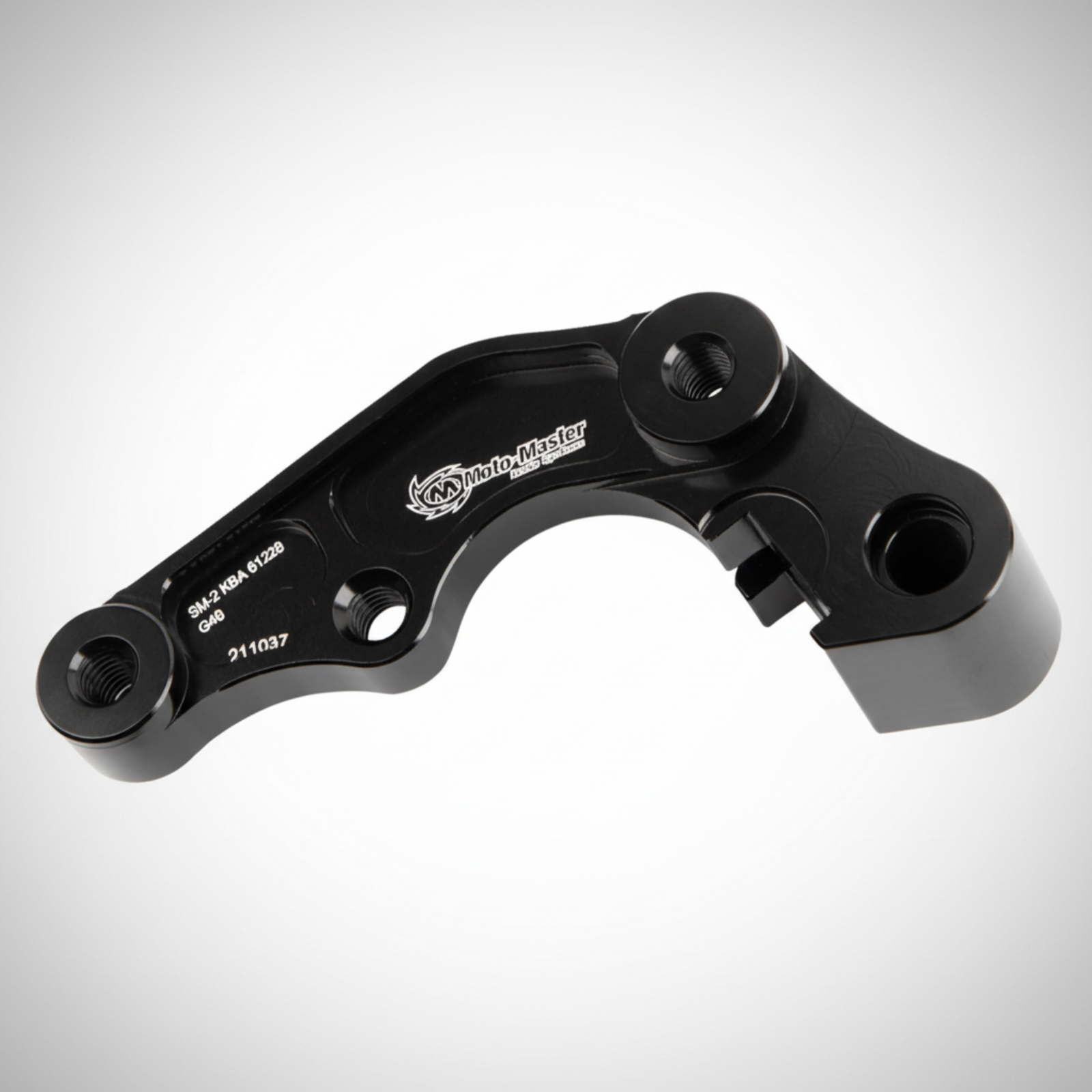 Black anodized aluminum caliper adapter from Moto-Master for Yamaha dirtbikes running an oversized rotor.