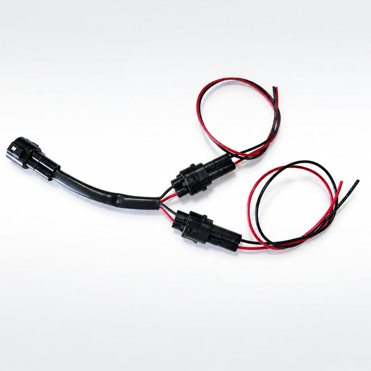 MotoMinded MM-T7-ACC accessory power harness pigtail splitter for the Yamaha Tenere 700 showing the factory matched connector.