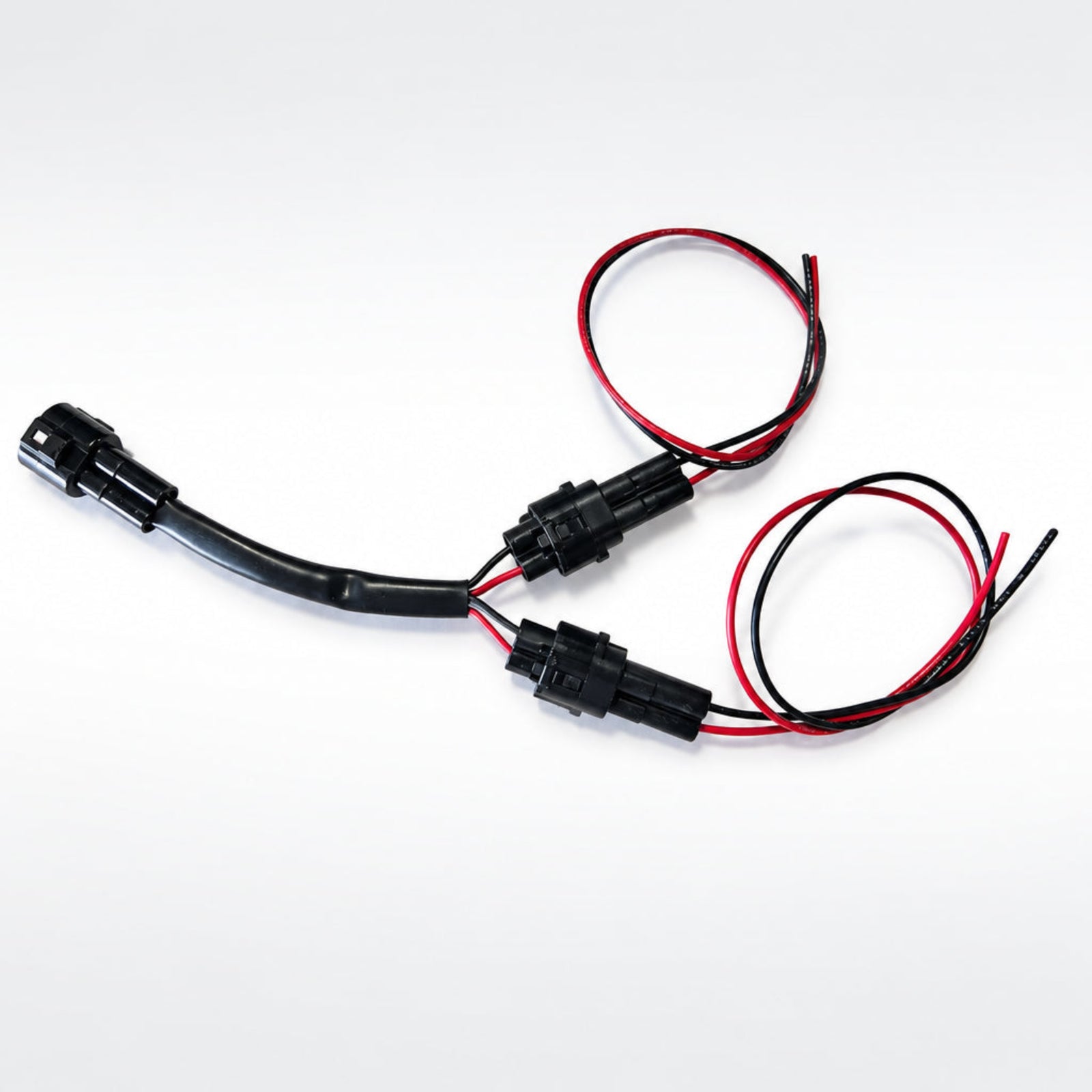 MotoMinded MM-T7-ACC accessory power harness pigtail splitter for the Yamaha Tenere 700 showing the factory matched connector.