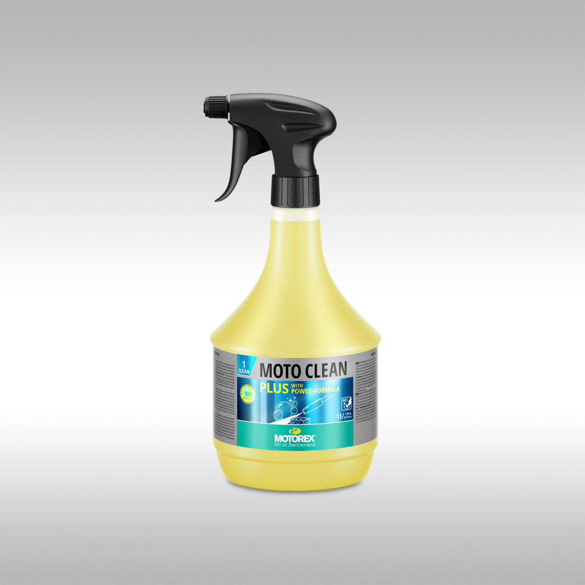 Clear spray bottle filled with yellow Motorex Moto Clean on a light gray background.