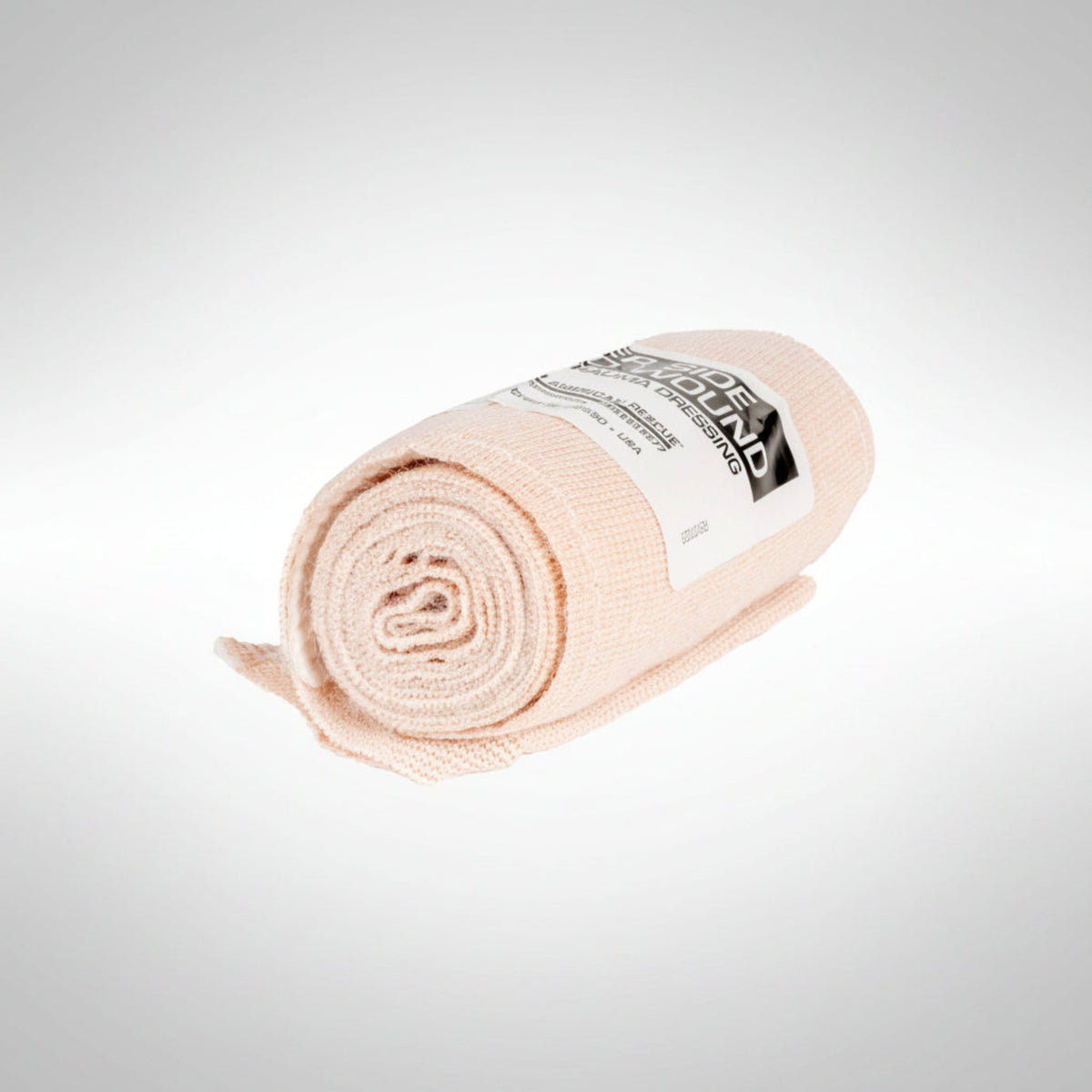 Rolled up emergency trauma dressing on a light gray background