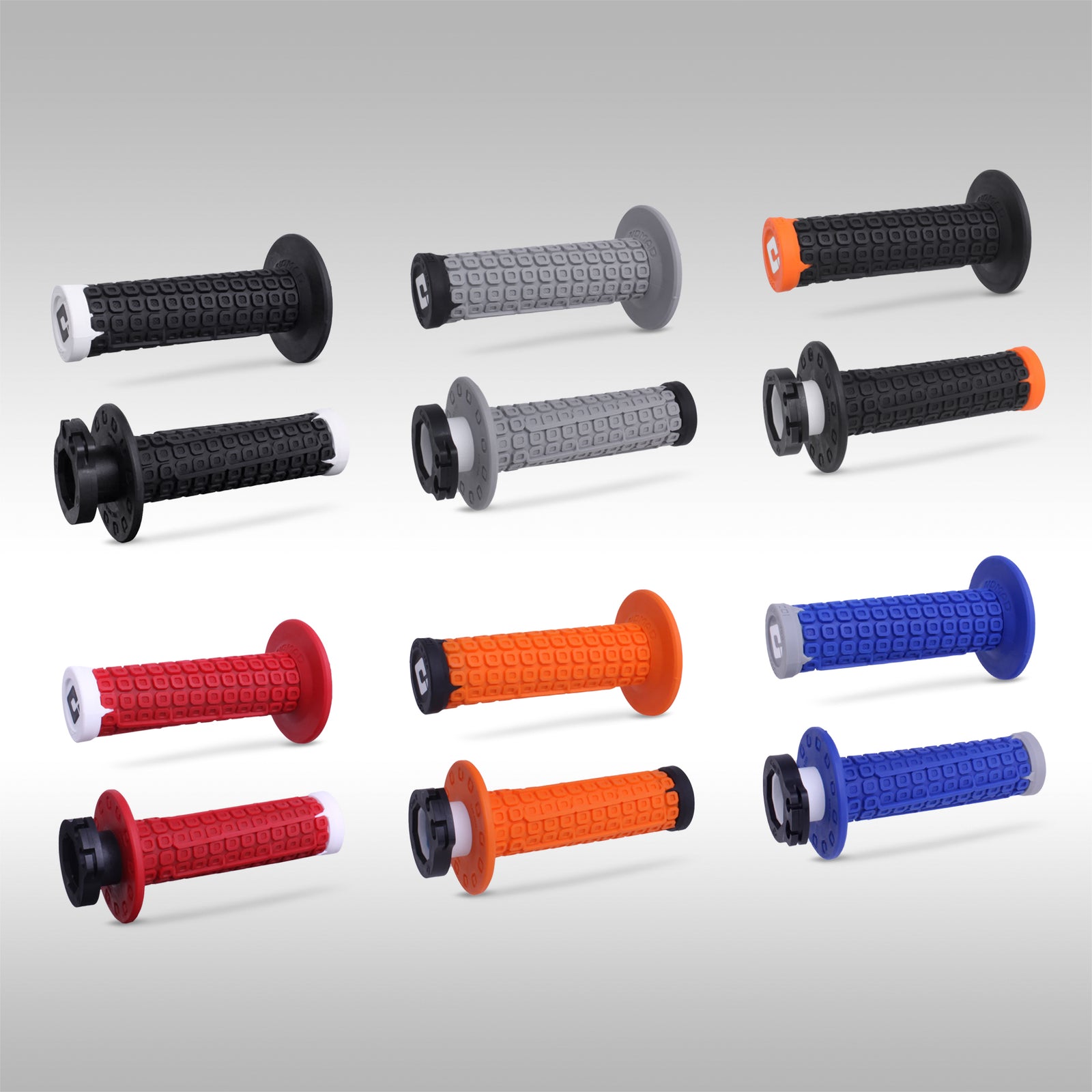 ODI Nomad motorcycle grips shown in all available colors on a light gray background