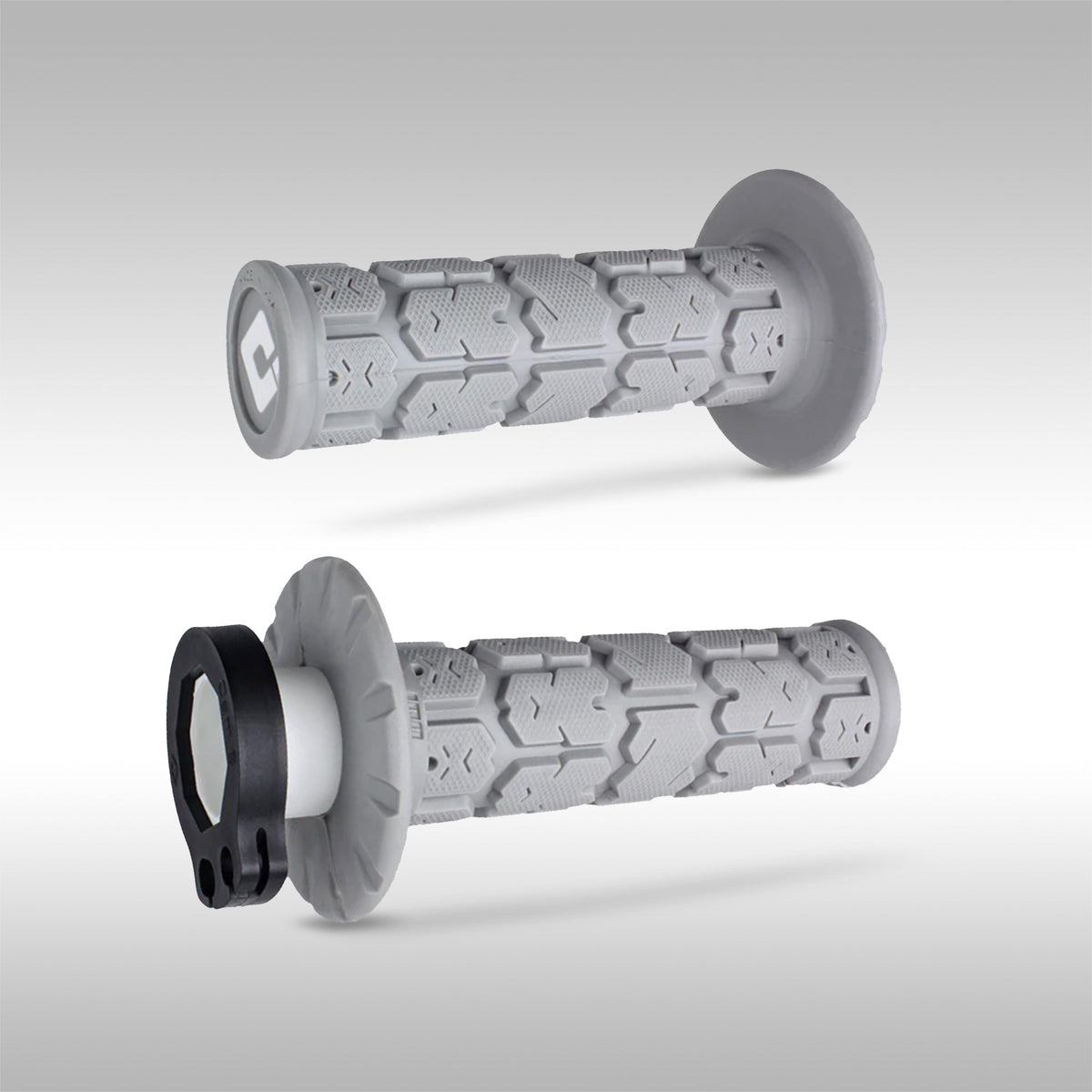 A pair of Gray ODI V2 Lock-On Rogue Moto Grips on a gray background