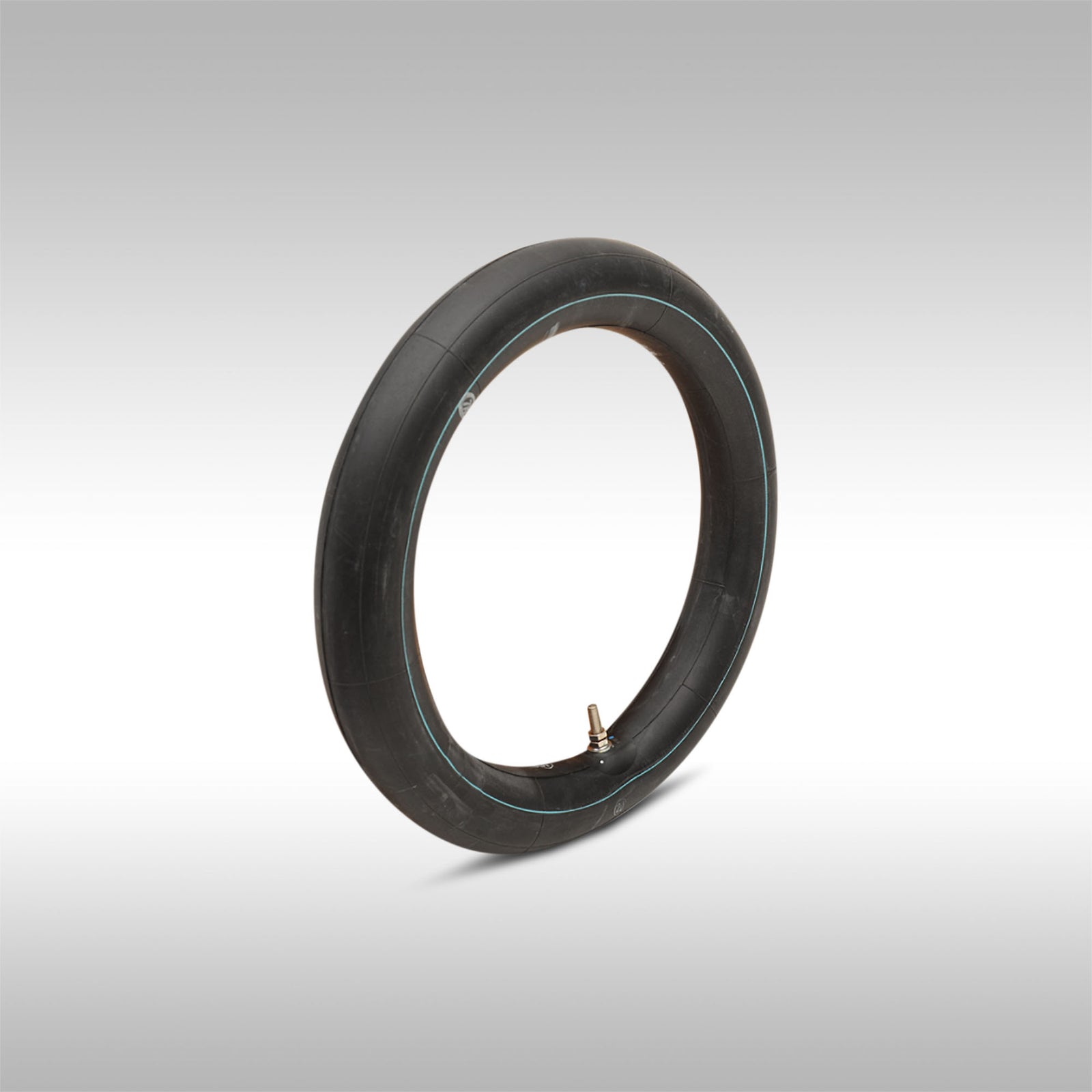 Black inner tube on a gray background
