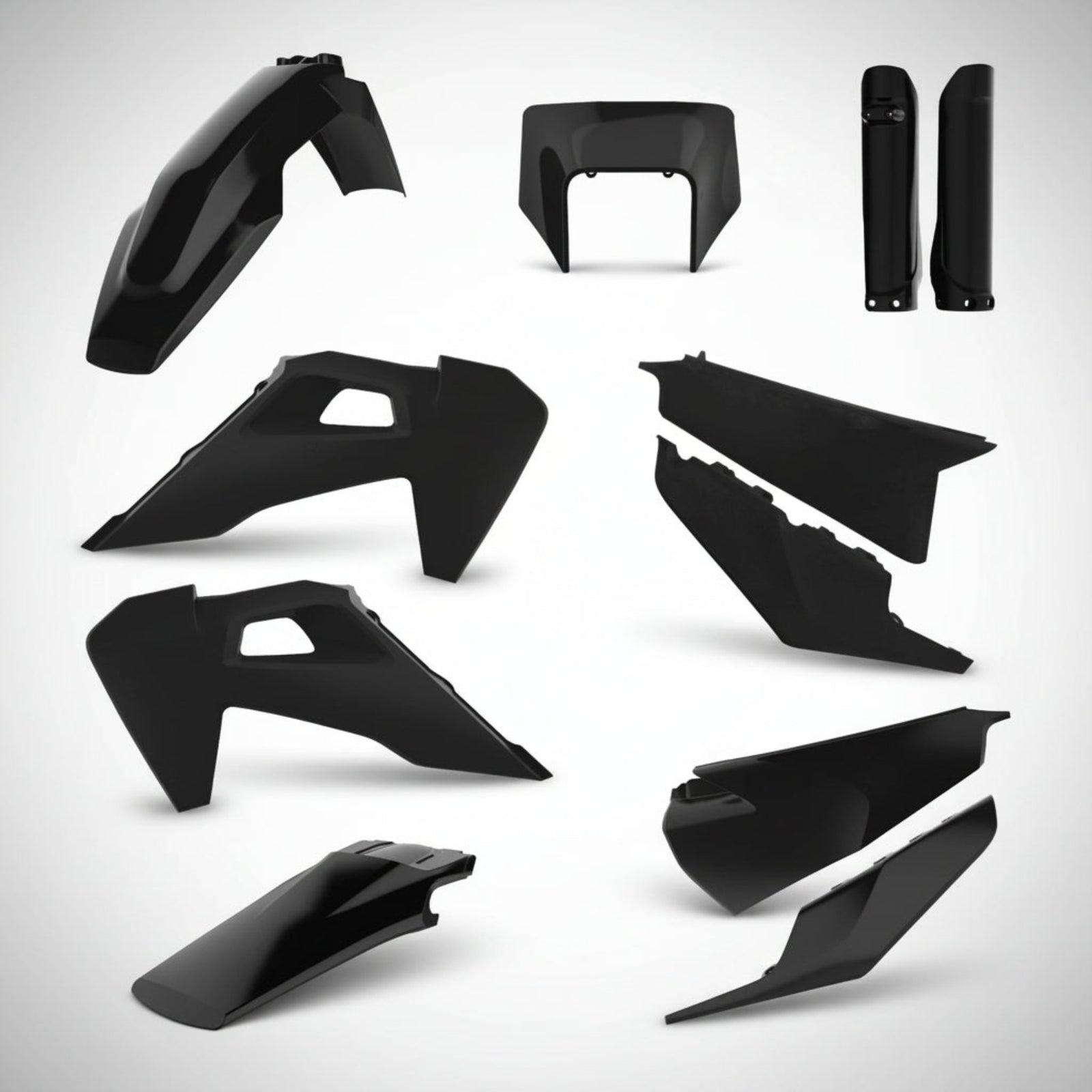 Set of black Polisport motorcycle plastic parts on a white background