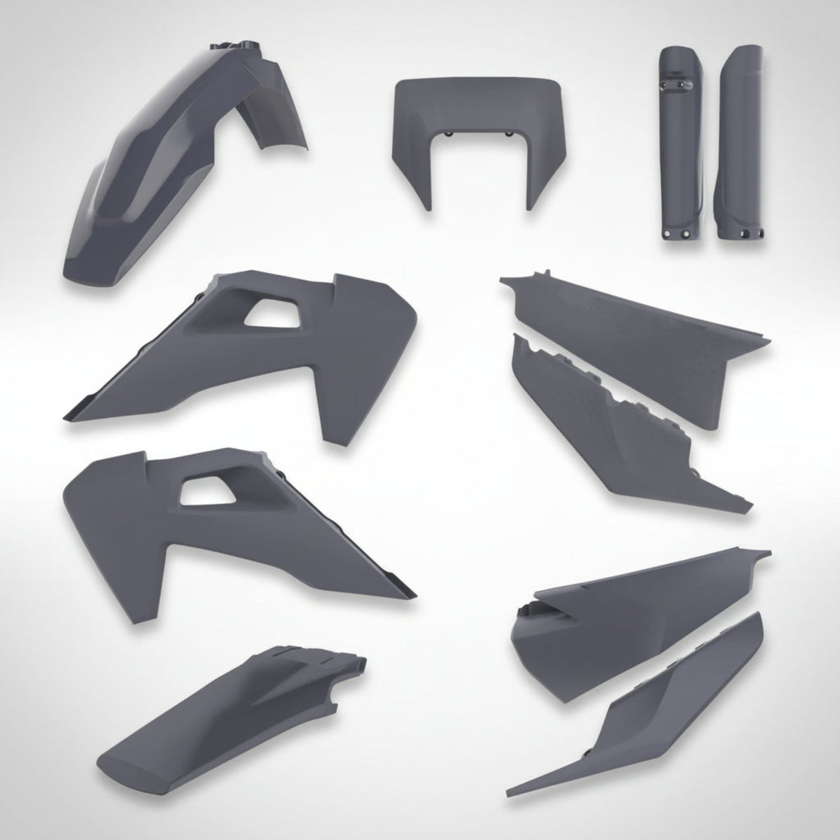 Set of gray Polisport motorcycle plastic parts on a white background
