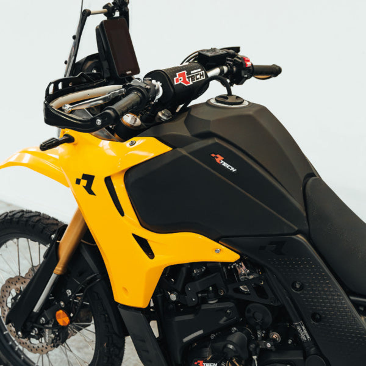 Yellow Tenere 700 with the 6.1 Gallon RTech fuel tank installed.
