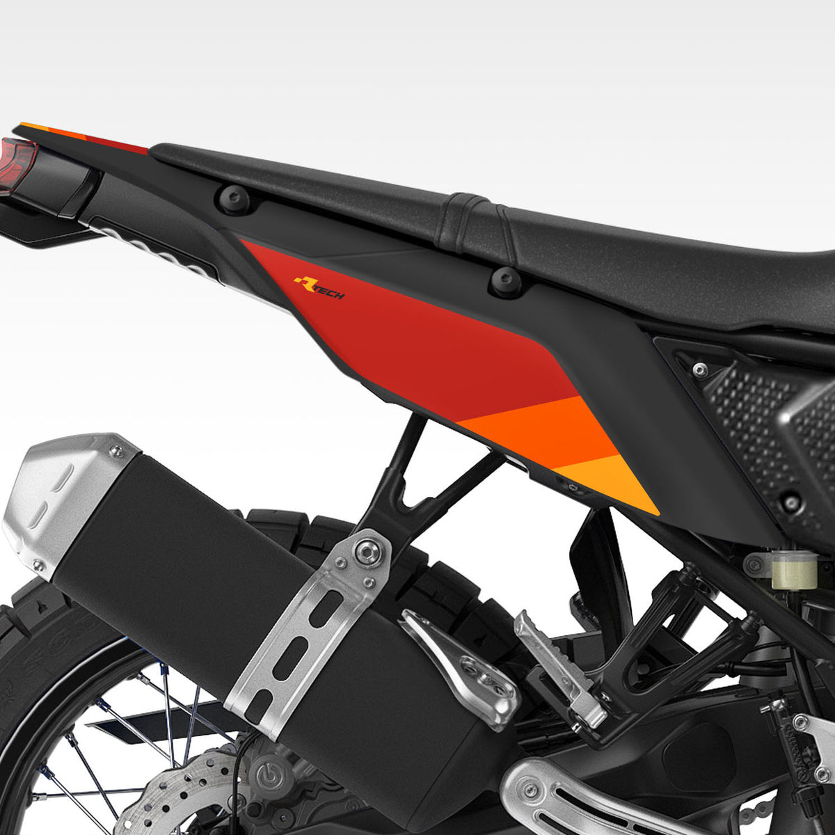 Rear quarter, side view of a Tenere 700 with an all black RTech plastic kit and the TMBR MOTO Red, Orange, Yellow stripe graphics kit.