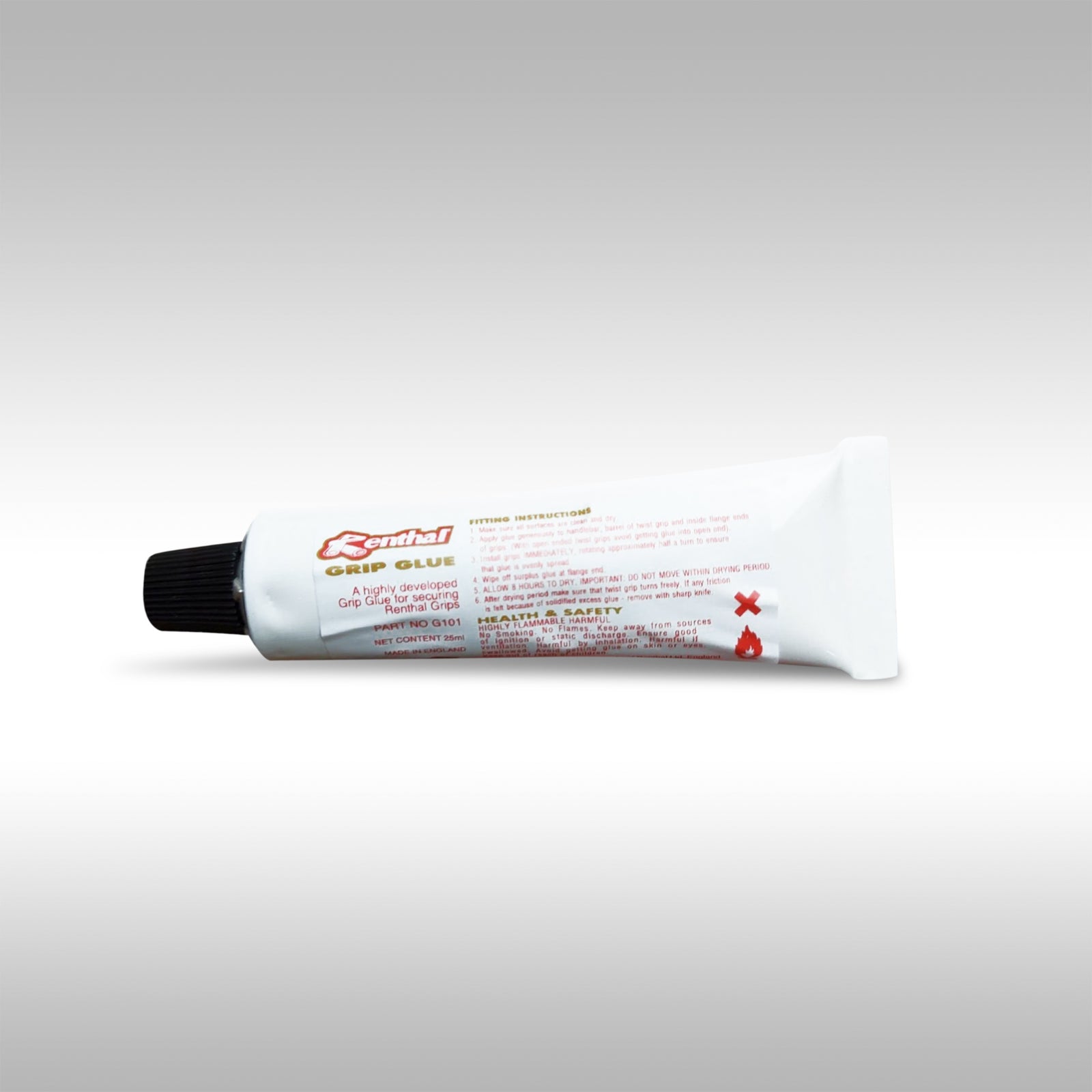 A tube of Renthal grip glue with the cap on and label visible, designed for motorcycle handlebar grips.
