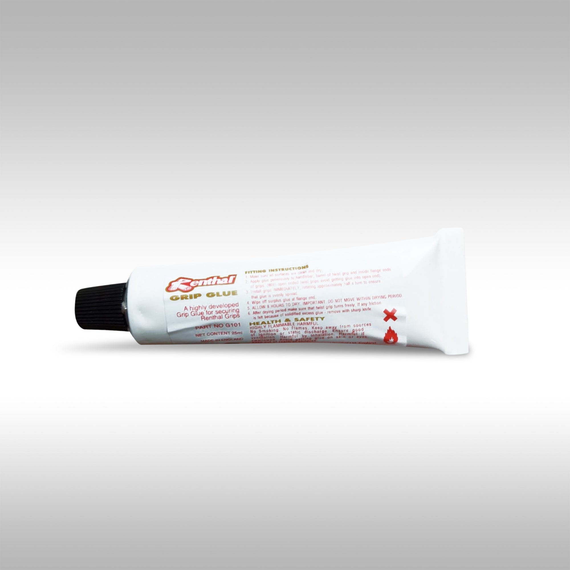 A tube of Renthal grip glue with the cap on and label visible, designed for motorcycle handlebar grips.