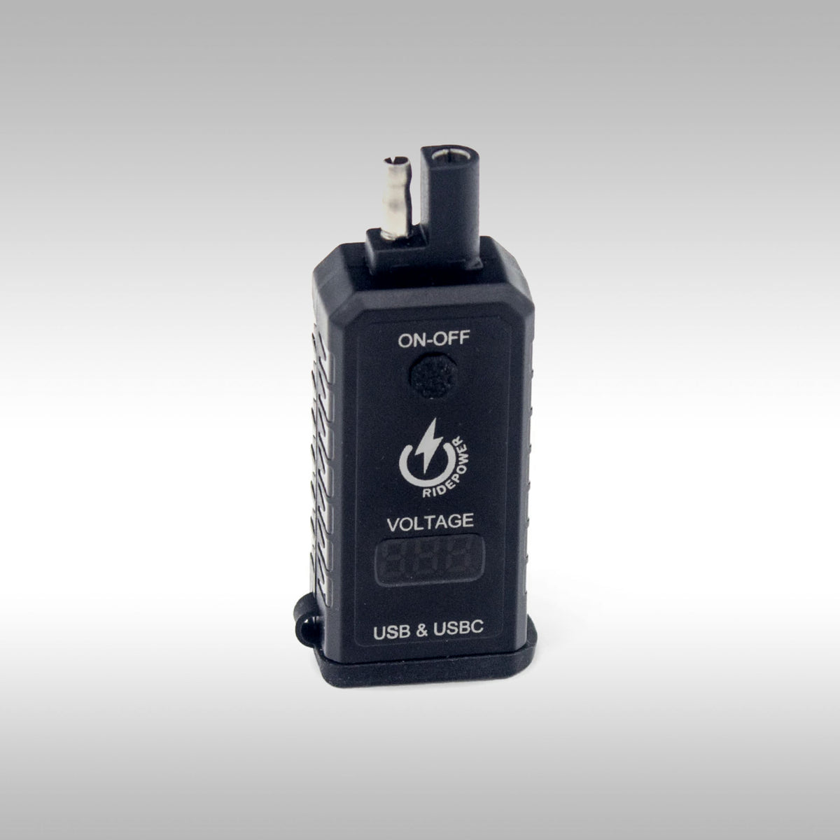 RidePower SAE To USB-A USB-C Outlet With Voltage Display on gray background