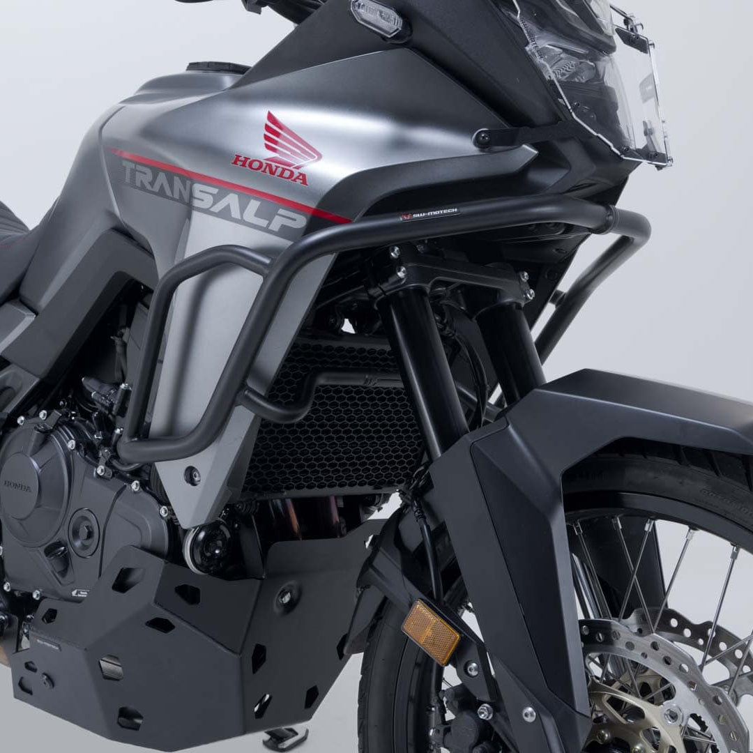 SW-MOTECH SBL.01.070.10002/B black steel crash bars mounted on a Honda XL750 Transalp adventure motorcycle.