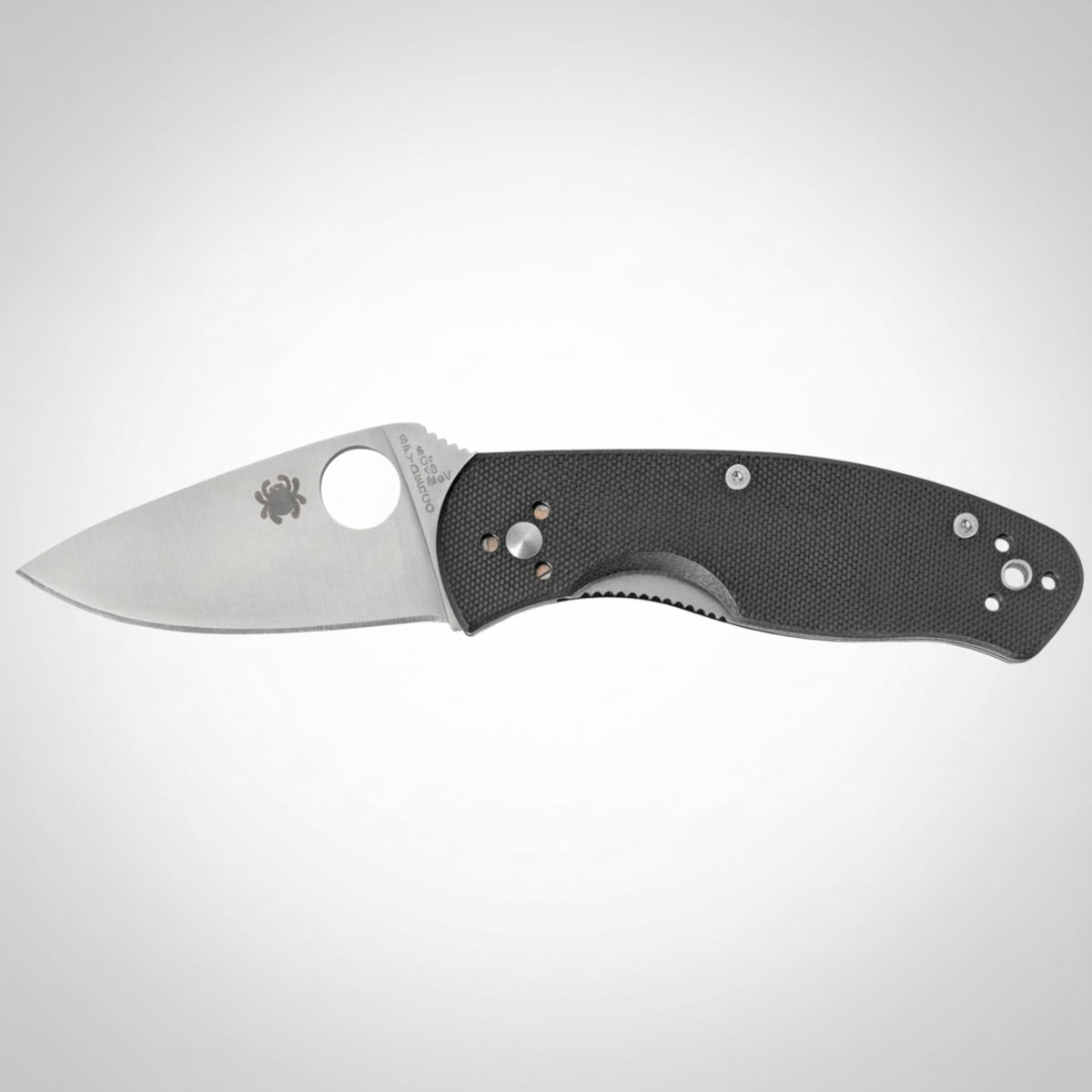 Spyderco Persistence C136GP folding knife showing the full-flat grind blade and black G-10 handle.