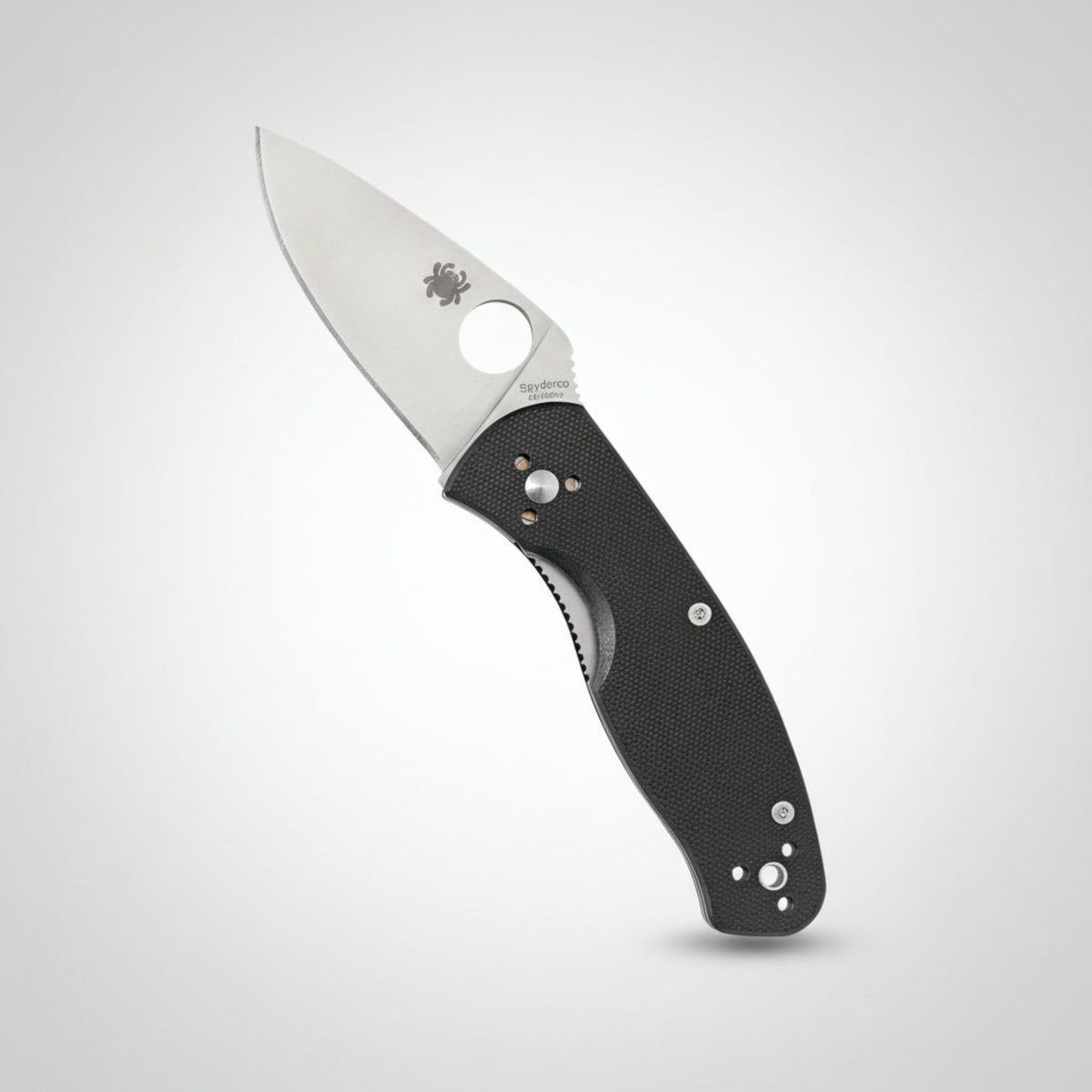 Spyderco Persistence C136GP folding knife showing the full-flat grind blade and black G-10 handle.