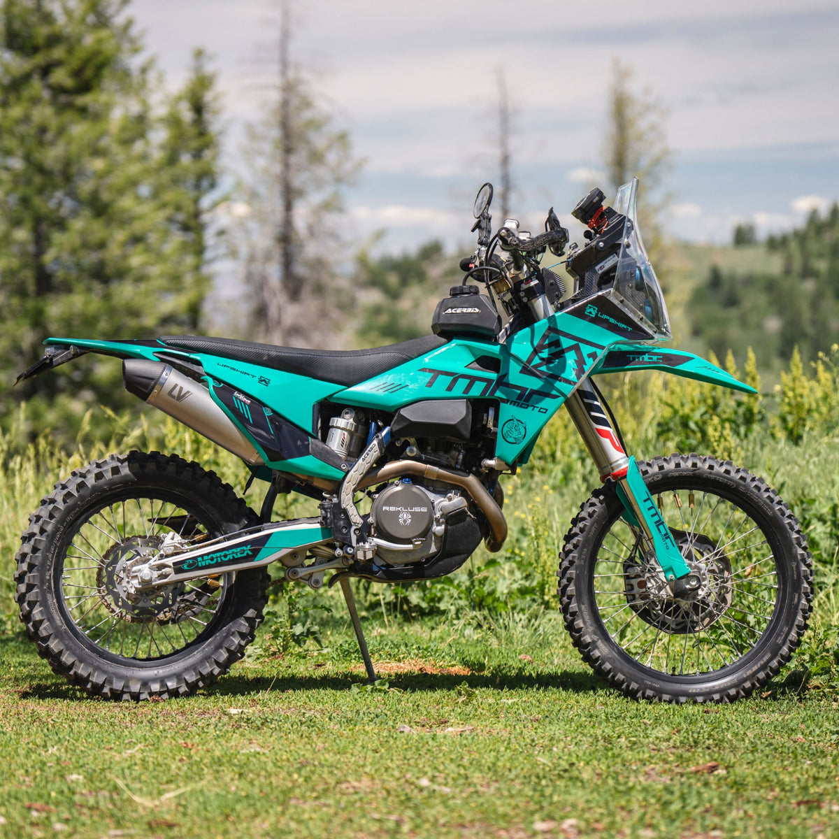 LeoVince LV-X EVO stainless steel slip-on exhaust with carbon fiber end cap for KTM and Husqvarna enduro models.