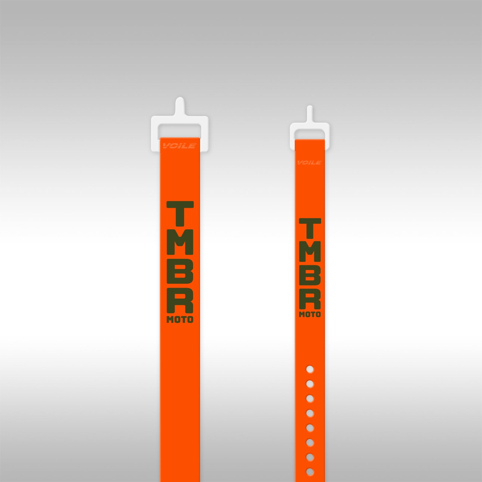Two orange straps with 'TMBR MOTO' branding on a gray background
