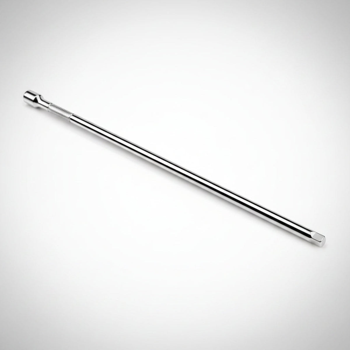 Tekton 1/4 inch drive standard socket extension showing the polished chrome finish and spring-loaded detent ball.