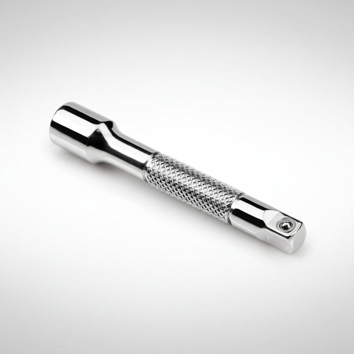 Tekton 1/4 inch drive standard socket extension showing the polished chrome finish and spring-loaded detent ball.