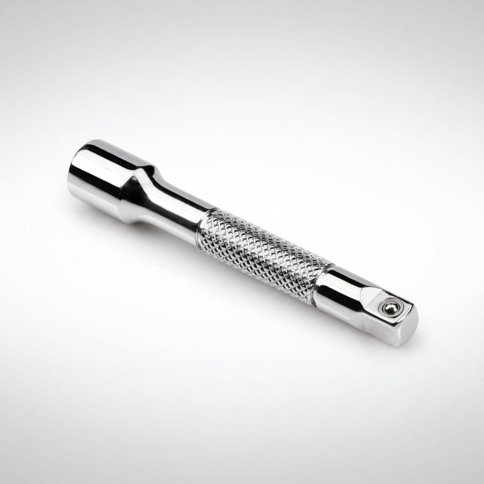 Tekton 1/4 inch drive standard socket extension showing the polished chrome finish and spring-loaded detent ball.