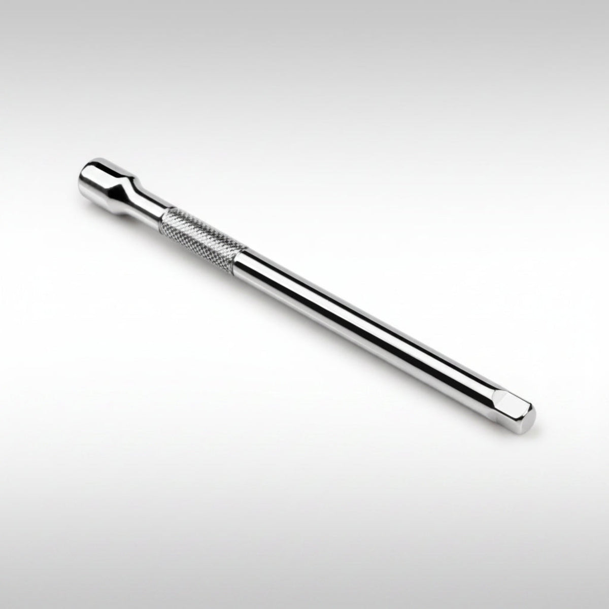 Tekton 1/4 inch drive standard socket extension showing the polished chrome finish and spring-loaded detent ball.