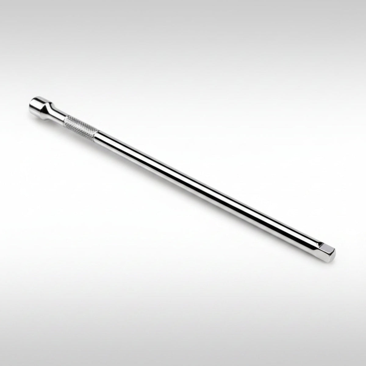 Tekton 1/4 inch drive standard socket extension showing the polished chrome finish and spring-loaded detent ball.