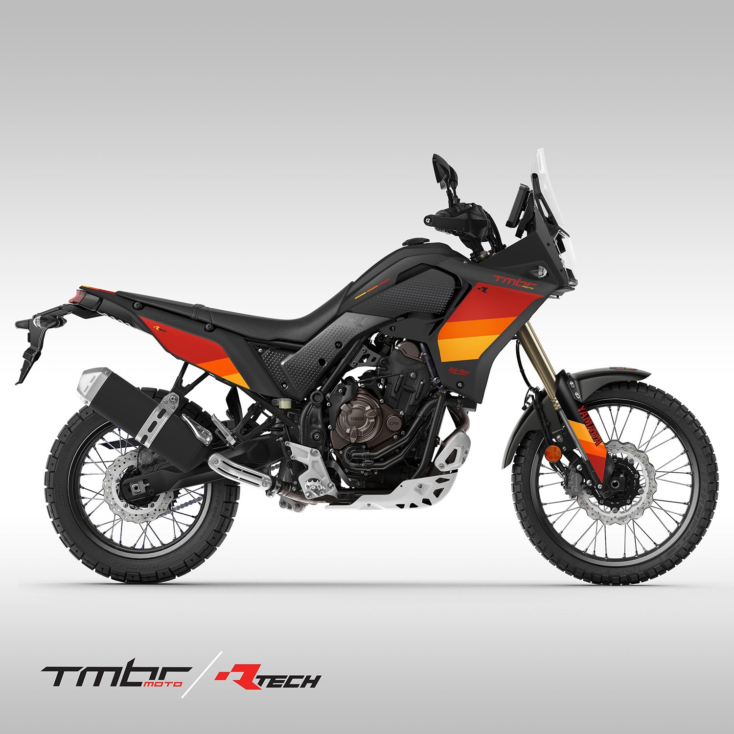 Side view of a Tenere 700 with an all black RTech plastic kit and the TMBR MOTO Red, Orange, Yellow stripe graphics kit.