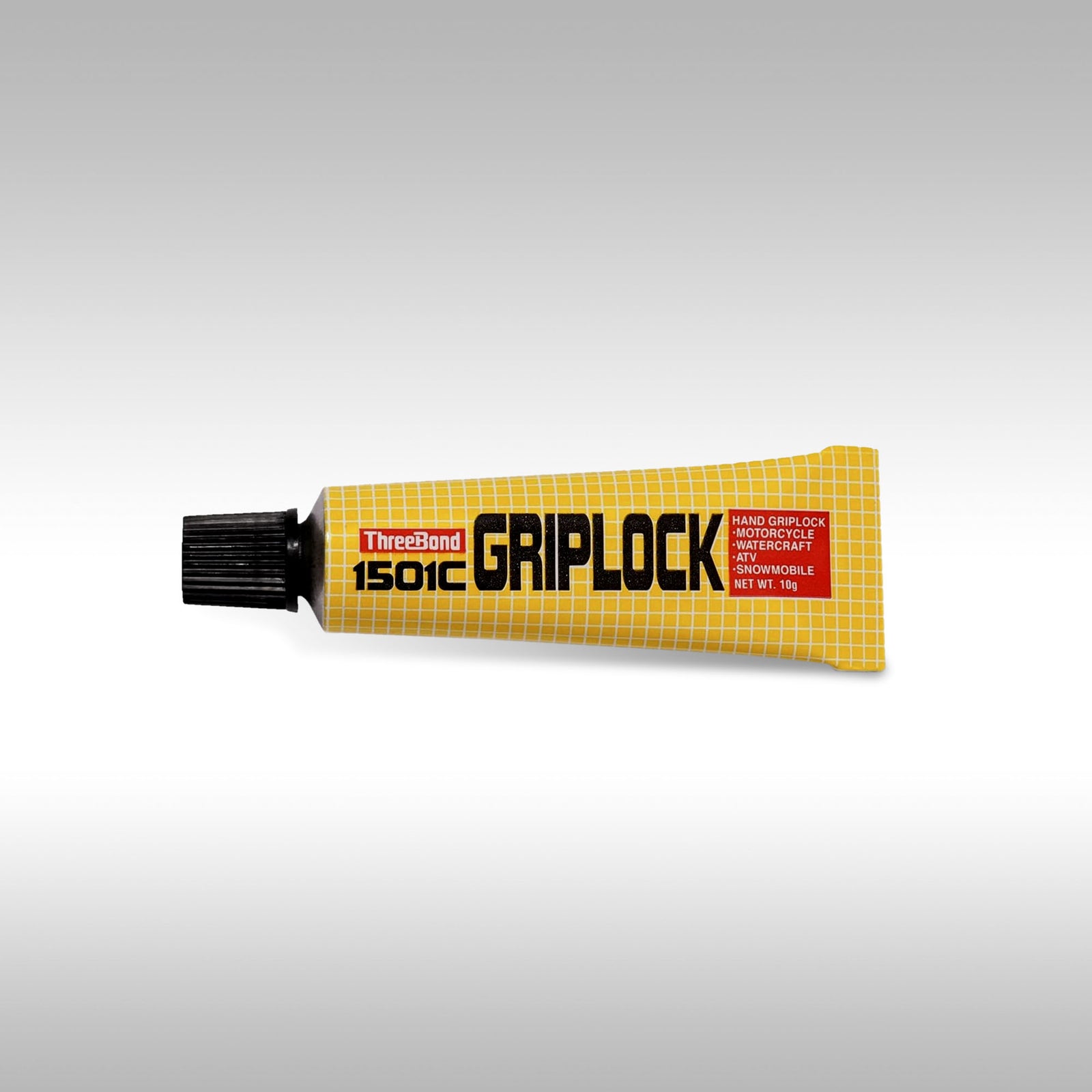 A tube of ThreeBond Griplock Grip Glue against a gray background.