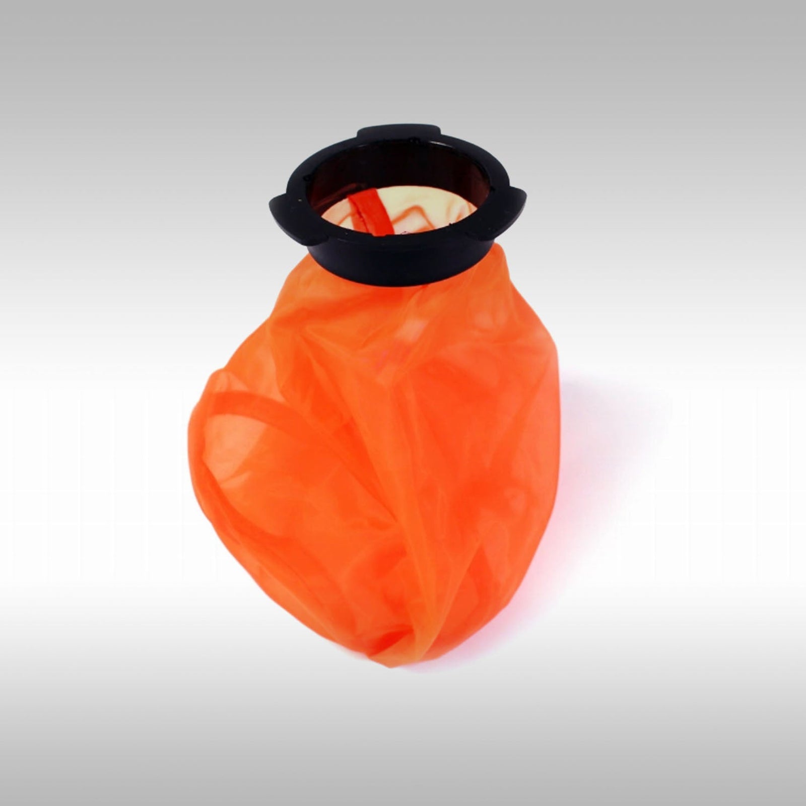 Twin Air orange mesh fuel tank filter on a light gray background.