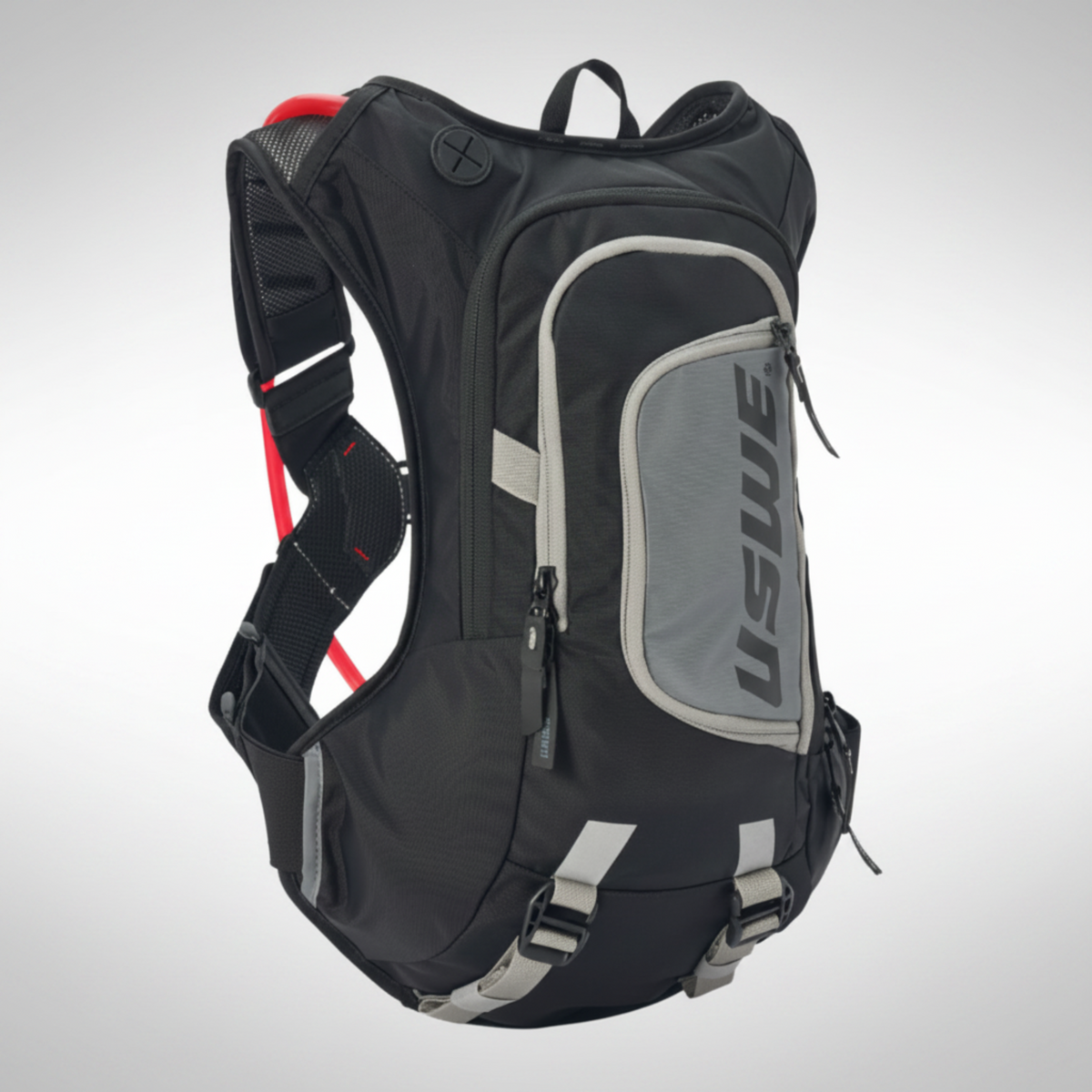 Black USWE moto hydration backpack with gray accents on a white background