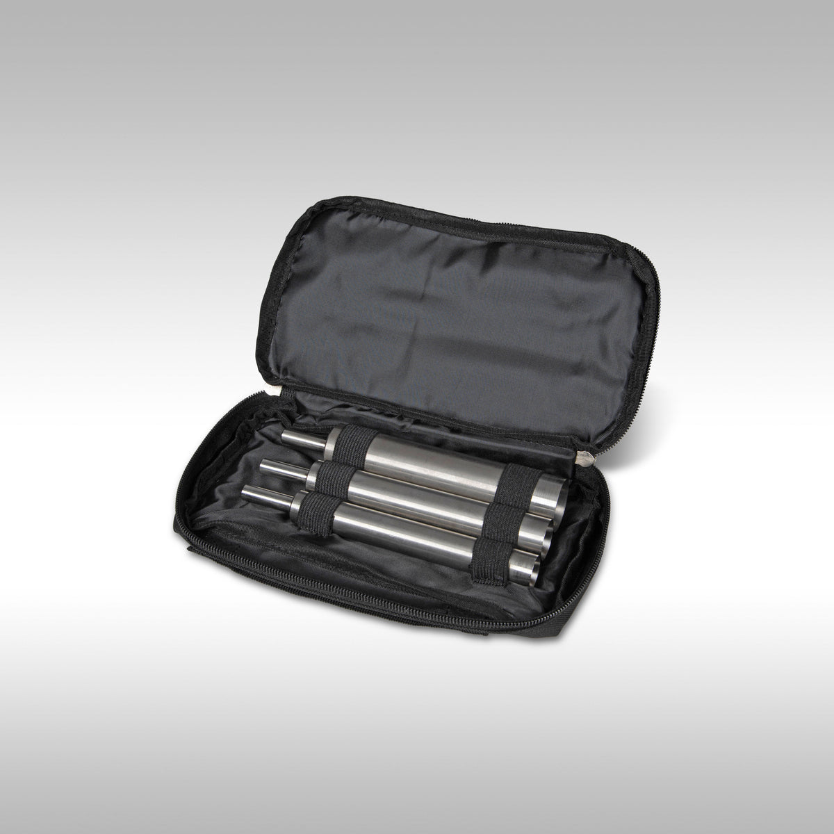 Black carrying case with two silver cylindrical objects on a light background