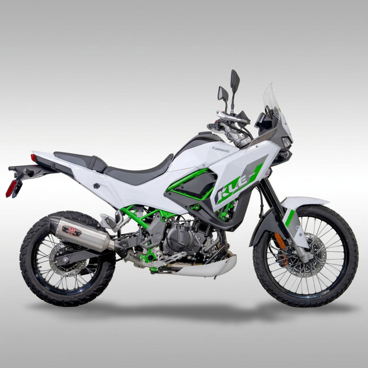 Yoshimura 14500B0520 R-77 stainless steel slip-on exhaust muffler with carbon fiber end cap mounted on a Kawasaki KLE500.