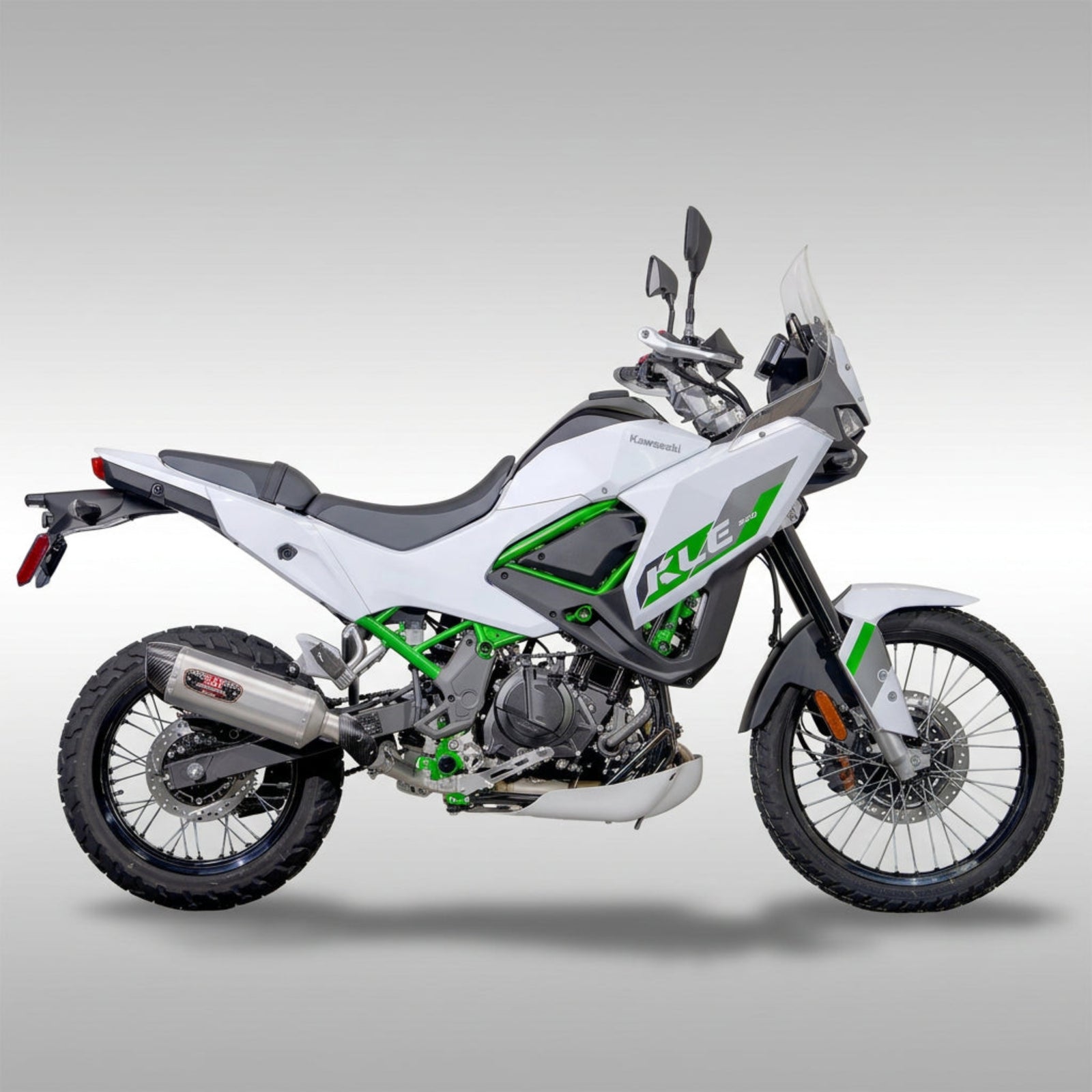 Yoshimura 14500B0520 R-77 stainless steel slip-on exhaust muffler with carbon fiber end cap mounted on a Kawasaki KLE500.