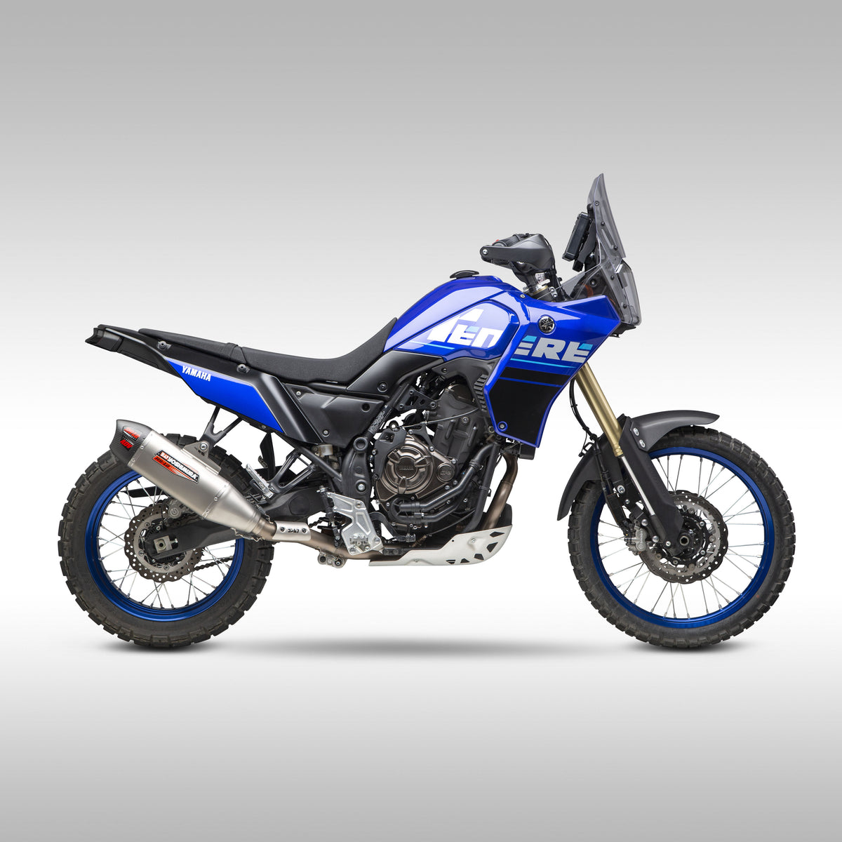 Blue Tenere 700 with Yoshimura RS-12 Muffler on gray bckground