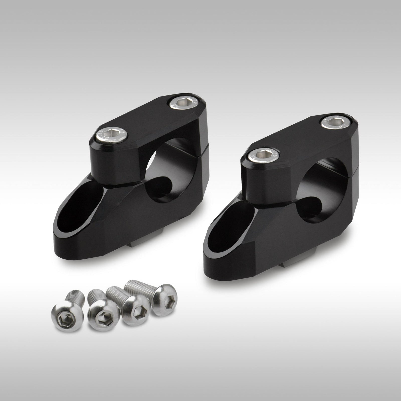 Zeta offset bar riser kit for motorcycle handlebars shown in CNC-machined aluminum.
