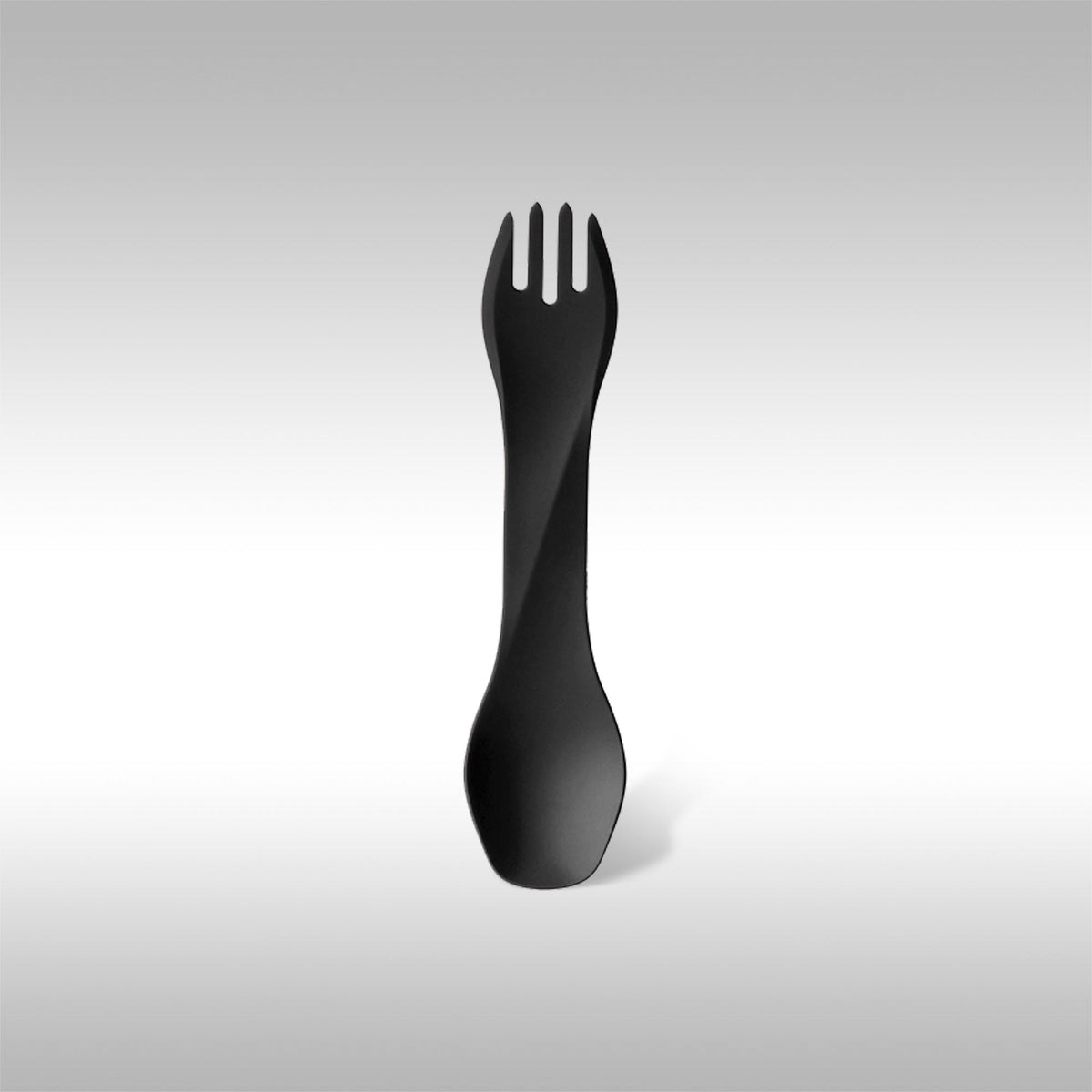 Black humangear UNO spork on a gray background