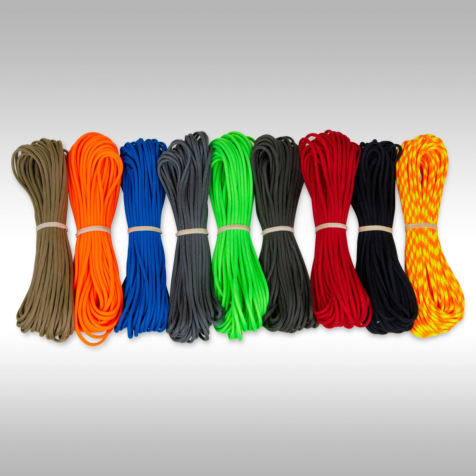 A collection of 50 foot hanks of USA Made paracord ropes in various colors.