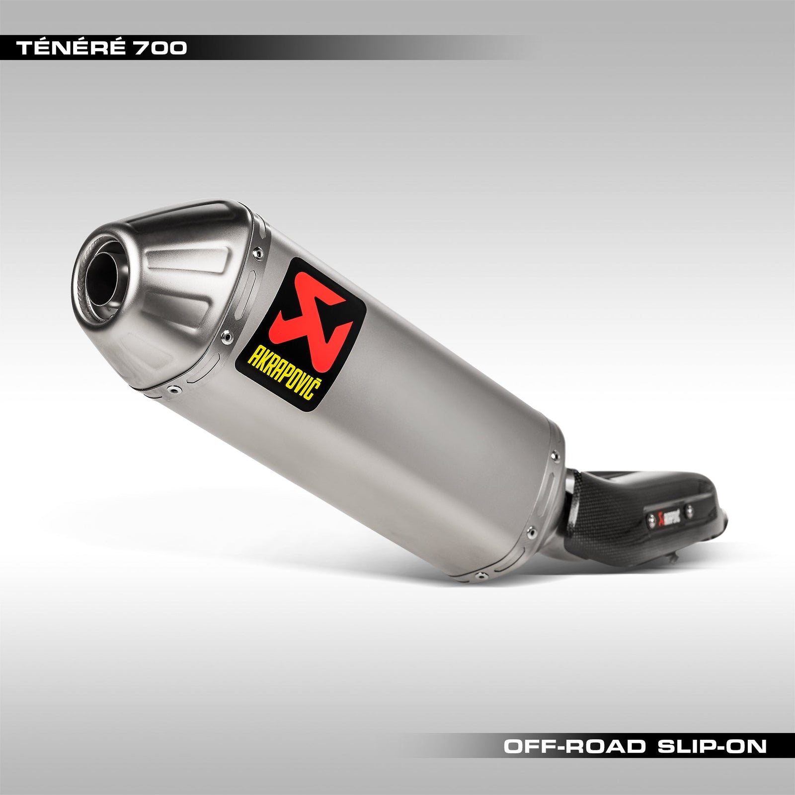 Rear 3/4 view of the titanium Akrapovic off-road slip-on exhaust for the Yamaha Tenere 700