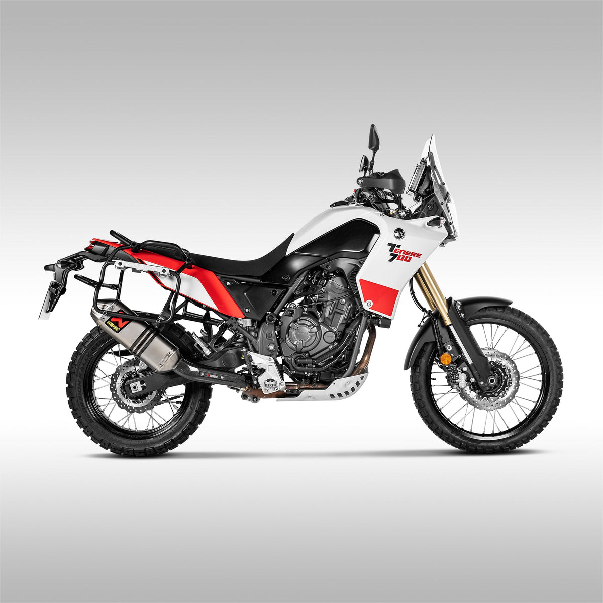 Side view of the titanium Akrapovic off-road slip-on exhaust for the Yamaha Tenere 700