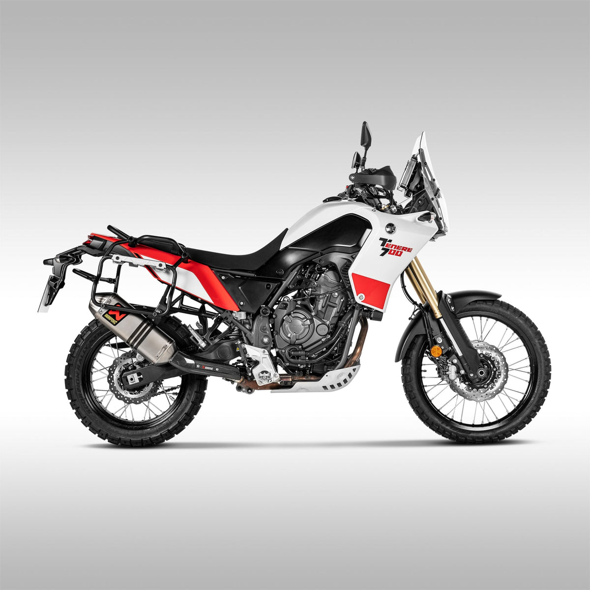 Side view of the titanium Akrapovic off-road slip-on exhaust for the Yamaha Tenere 700