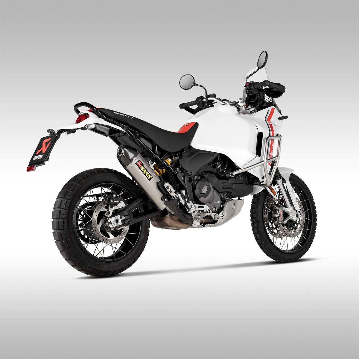 Akrapovic Titanium Slip-On Muffler for Ducati DesertX motorcycle installed on a stock machine.