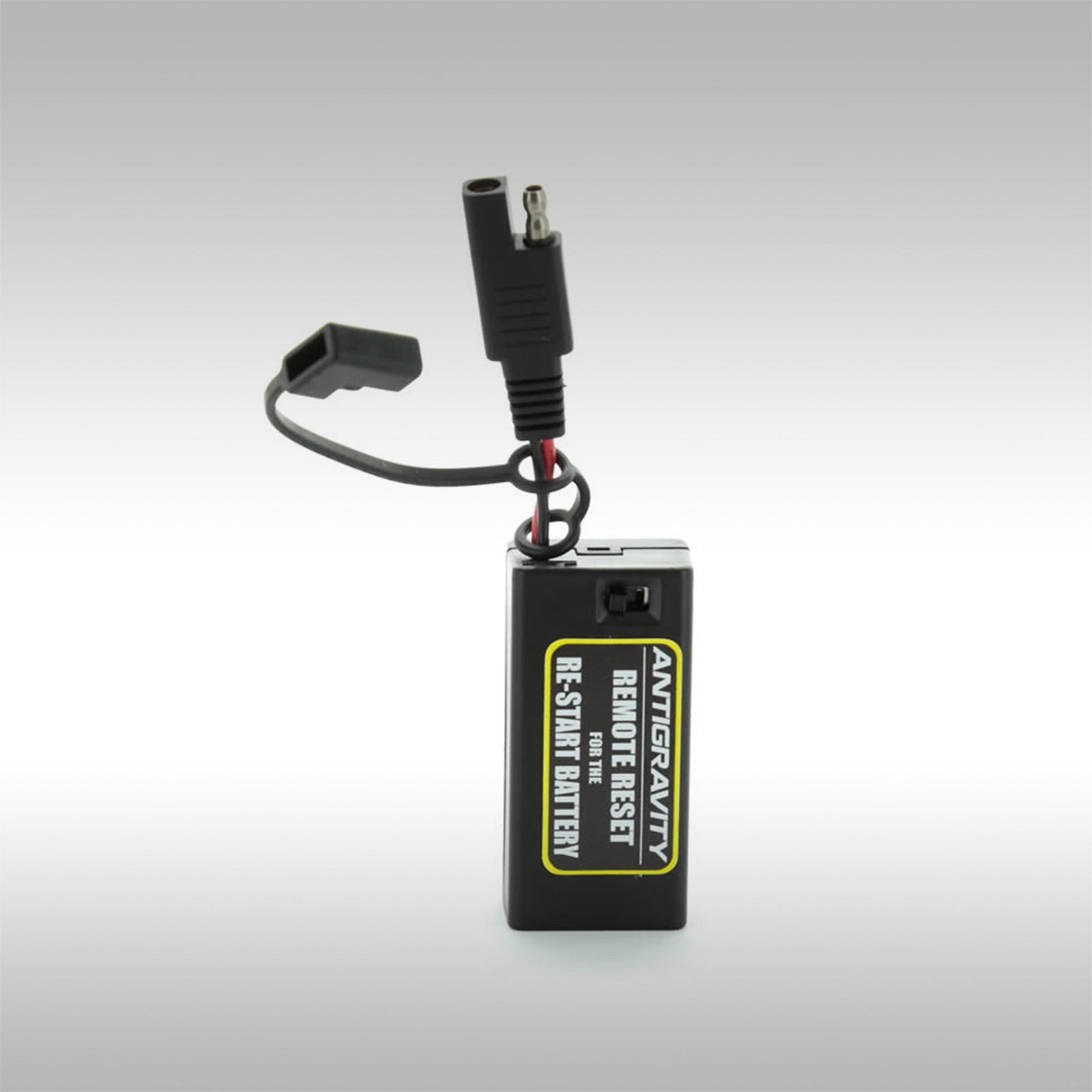 The Antigravity Re-Start Battery Remote. Plug this dongle into the SAE charging cable attached to your bike and activate your re-start battery