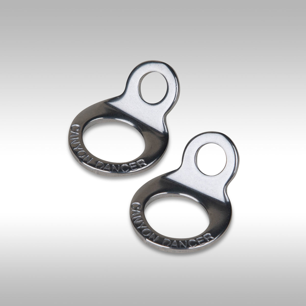 Canyon Dancer 90009 stainless steel tie down ring set showing the 8mm mounting hole and strap loop.