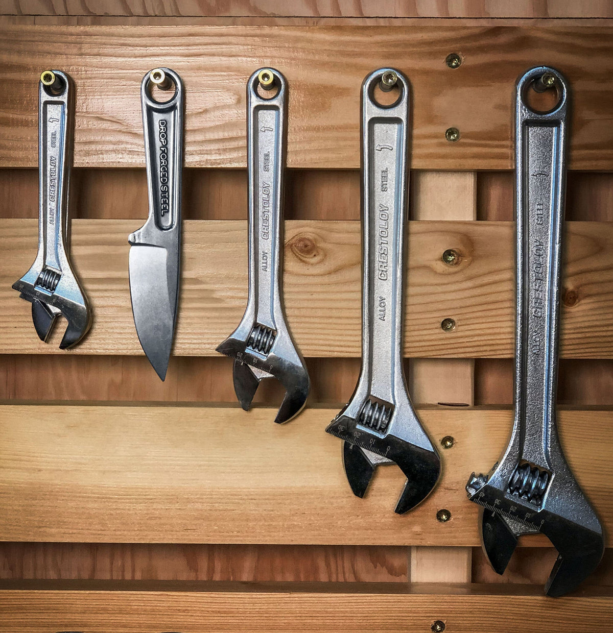 Ka-Bar 1119 Forged Wrench Knife drop-forged from 425 stainless steel, shown with included hard plastic sheath.